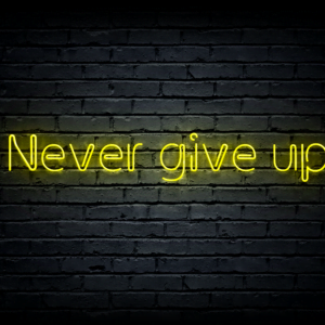 Led neono iškaba „Never give up”