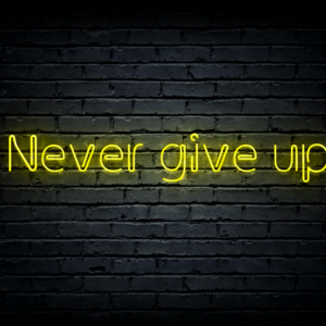 Led neono iškaba „Never give up“