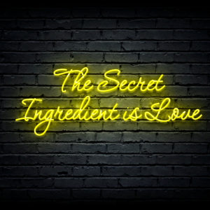 Led neono iškaba „The Secret Ingredient is Love”