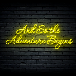 Led neon sign “And So the Adventure Begins”